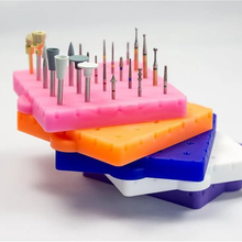 Autoclavable BurButler dental bur organizer with silicone base. Curion Dental