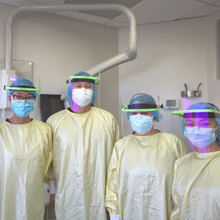 Ambience™ Face Shield - Écran de protection avec harnais de tête. Utilisé avec ou sans loupes. Entièrement réglable. Anti-rayures et sans éblouissement.