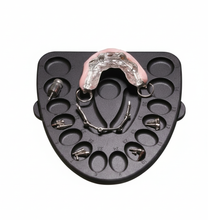 LaminateButler dental organizer tray with restorations and tools.